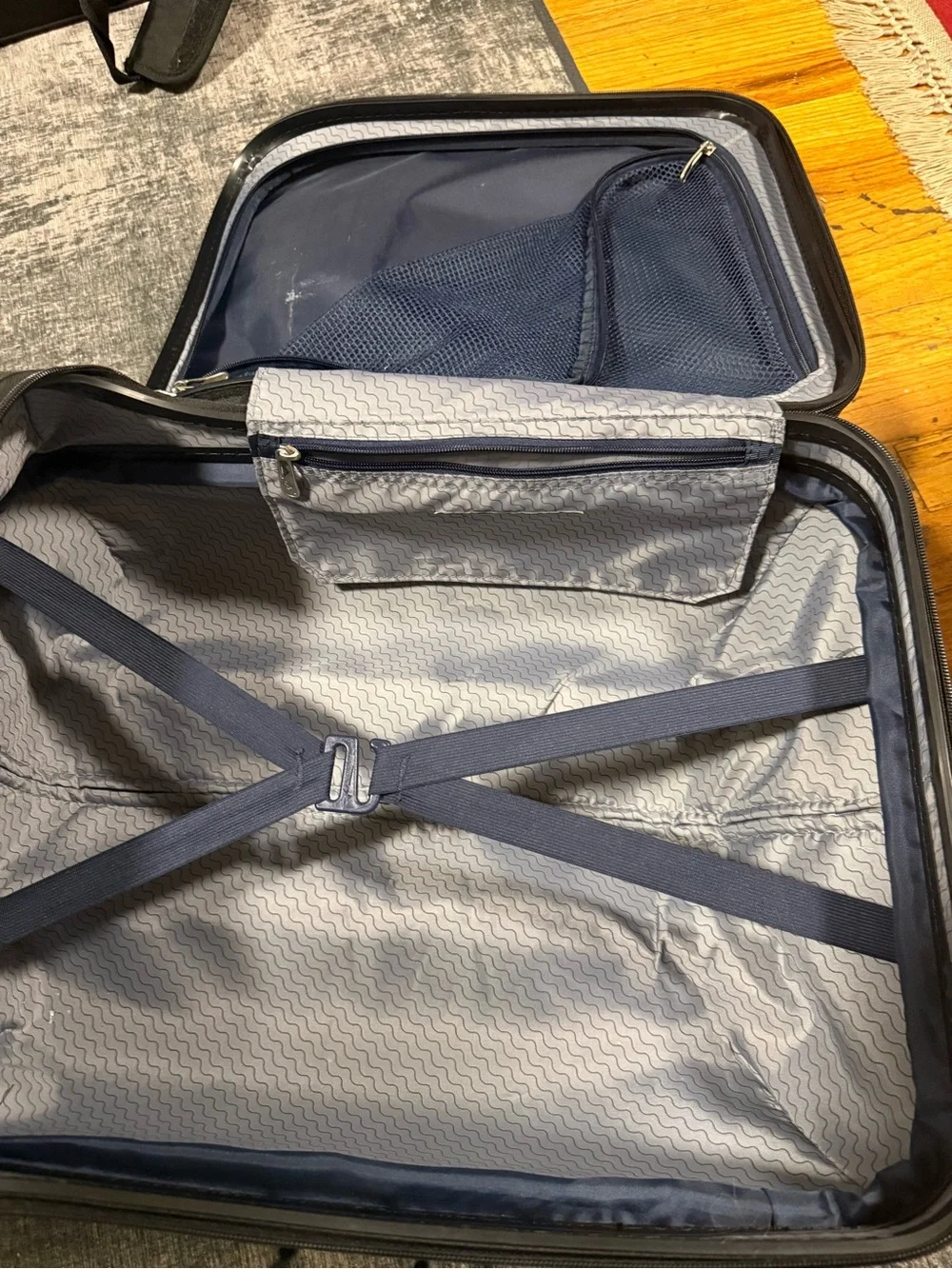 Unixes Gray Hard-Shell Spinner Carry-On Luggage from Macy’s wads $160